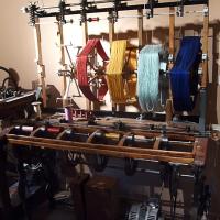 Dévidage des flottes sur des roquets (bobine)